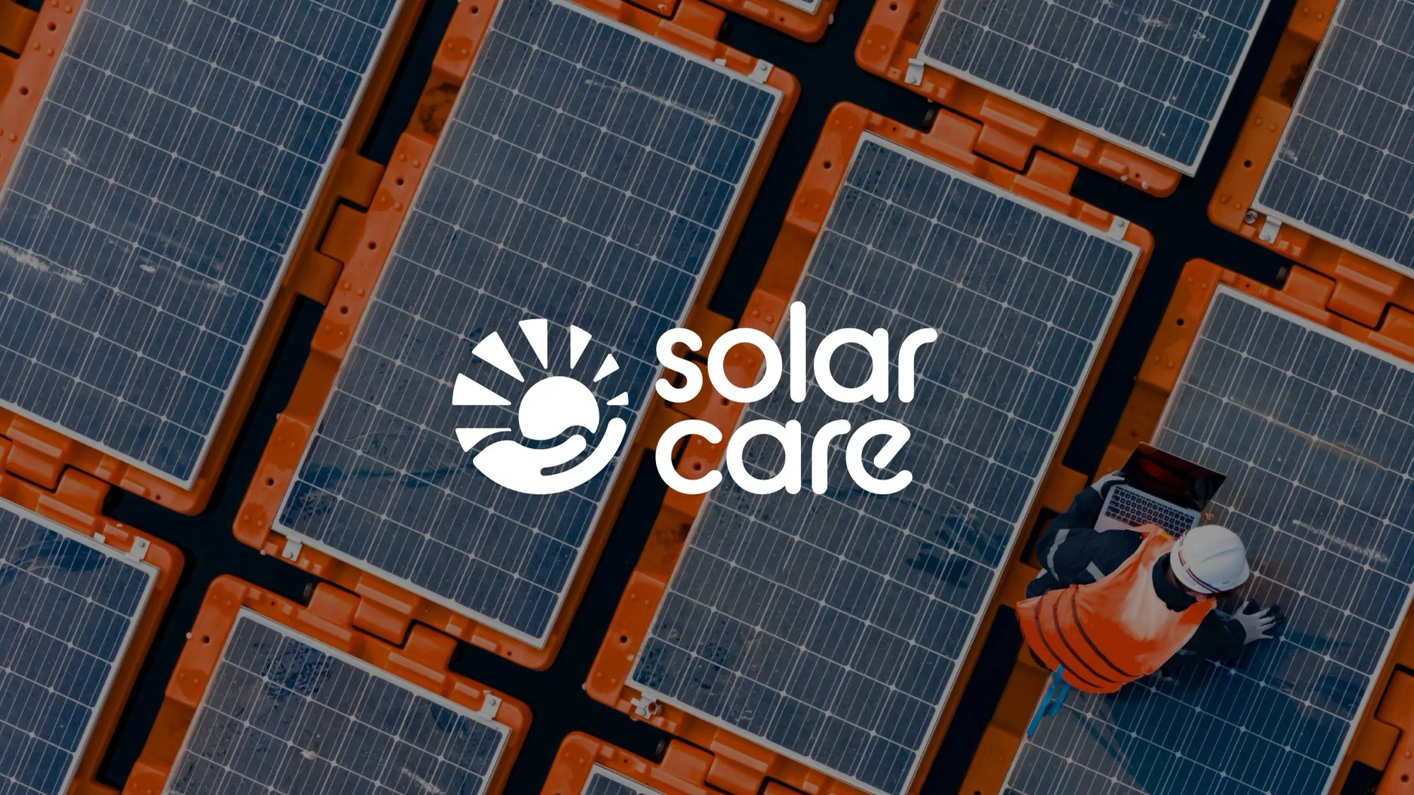 Solar Care logo displayed over an aerial view of solar panels and orange mounting hardware.